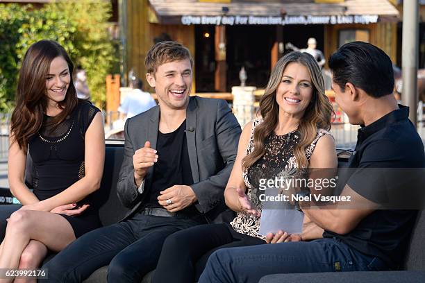 Alexandra Park, William Moseley and Elizabeth Hurley visit "Extra" at Universal Studios Hollywood on November 17, 2016 in Universal City, California.