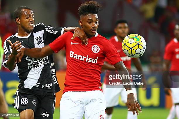 Vitinho of Internacional battles for the ball against Breno Lopes of Ponte Preta during the match between Internacional and Ponte Preta as part of...