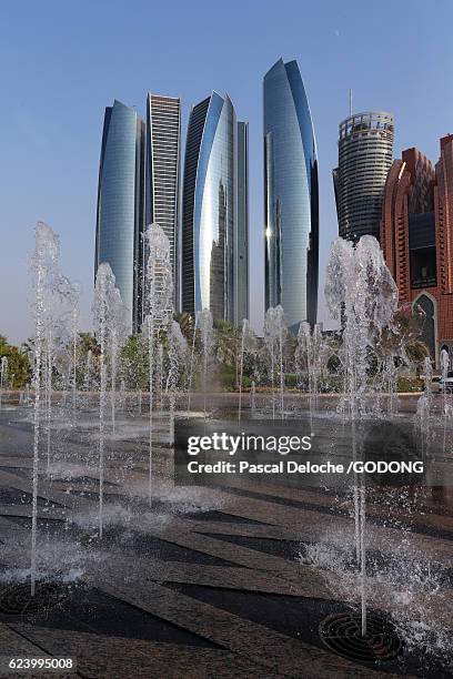 abu dhabi, the etihad towers building complex - batiment stock pictures, royalty-free photos & images