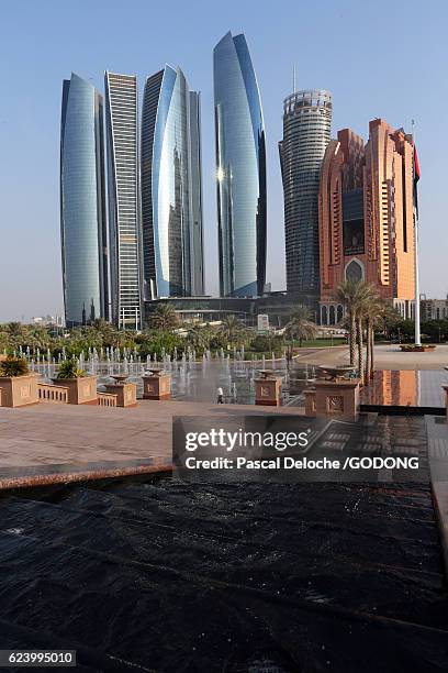 abu dhabi, the etihad towers building complex - batiment stock pictures, royalty-free photos & images