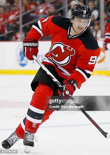 Jiri Tlusty of New Jersey Devils plays in the game against the Detroit Red Wings at the Prudential Center on December 11, 2015 in Newark, New Jersey.