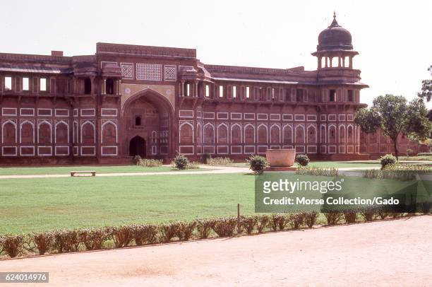 View of red sandstone walls outside the Jama Masjid Mosque, in the city of Fatehpur Sikri, located in the Agra district of Uttar Pradesh, India,...