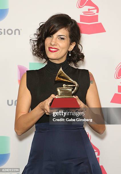 Recording artist Ceu poses with Best Portuguese Language Contemporary Pop Album award in the press room during The 17th Annual Latin Grammy Awards at...