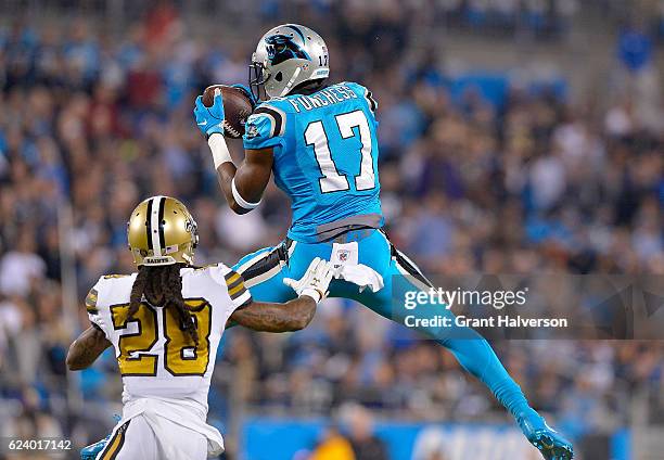 Devin Funchess of the Carolina Panthers makes a catch against B.W. Webb of the New Orleans Saints in the 2nd quarter during the game at Bank of...