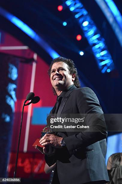 Singer/songwriter Carlos Vives accepts Record of the Year for 'La Bicicleta' onstage during The 17th Annual Latin Grammy Awards at T-Mobile Arena on...