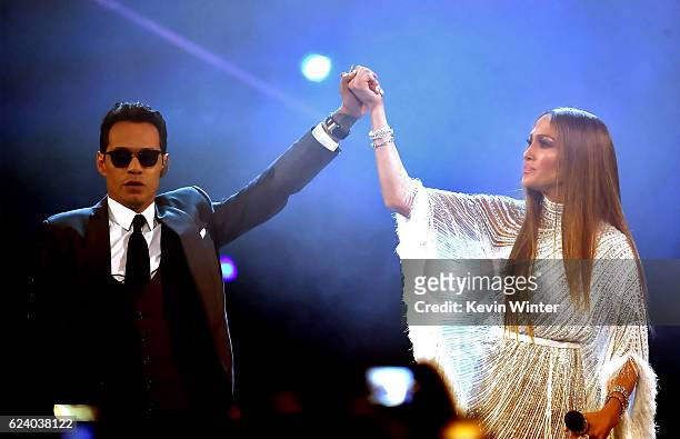 Singer Marc Anthony and singer/actress Jennifer Lopez perform onstage during The 17th Annual Latin Grammy Awards at T-Mobile Arena on November 17,...