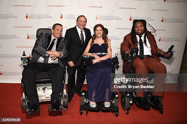 Allen T Brown, Gary Bettman, Denna Laing and Eric LeGrand attend the Christopher & Dana Reeve Foundation hosts "A Magical Evening" at Cipriani Wall...