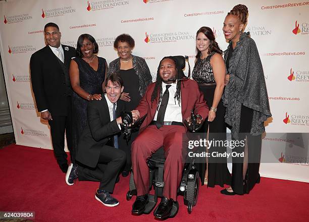 Actor and host Jerry O'Connell and Eric LeGrand pose for a photo with family during the Christopher & Dana Reeve Foundation hosts "A Magical Evening"...