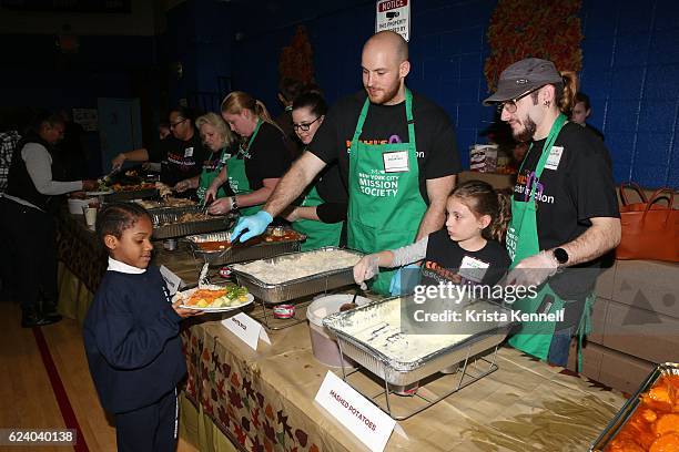 Guests and volunteers attend the Jean Shafiroff & Jay Moorhead Underwrite Annual Community Thanksgiving Dinner at NYC Mission Society at Minisink...