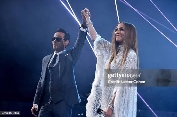 Singer Marc Anthony and singer/actress Jennifer Lopez perform onstage during The 17th Annual Latin Grammy Awards at T-Mobile Arena on November 17,...