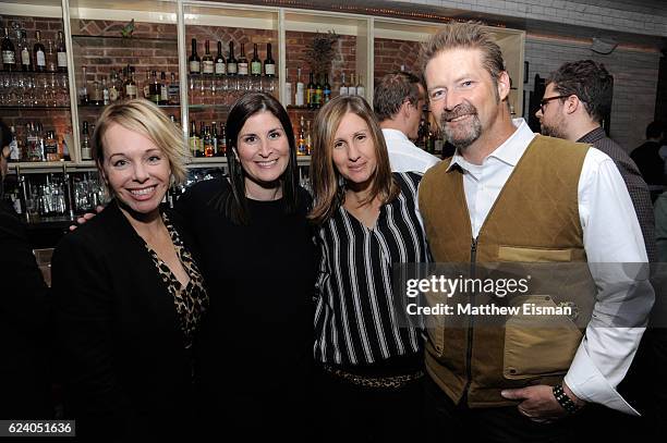 Shanna Belott, Lara Stolman, Leah Warshawski and Todd Soliday pose together for a photo at the afterparty for for New York premiere of "Swim Team" at...