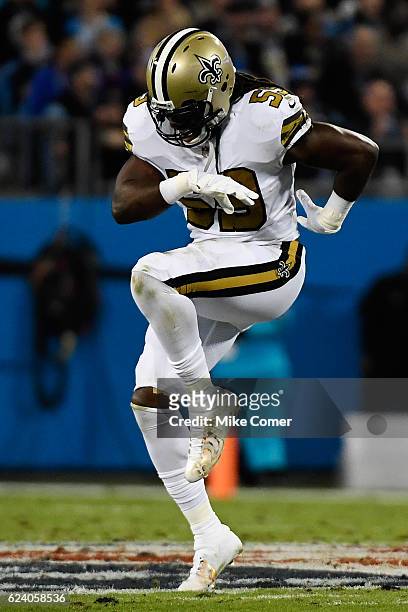 Dannell Ellerbe of the New Orleans Saints celebrates after sacking Cam Newton of the Carolina Panthers at Bank of America Stadium on November 17,...