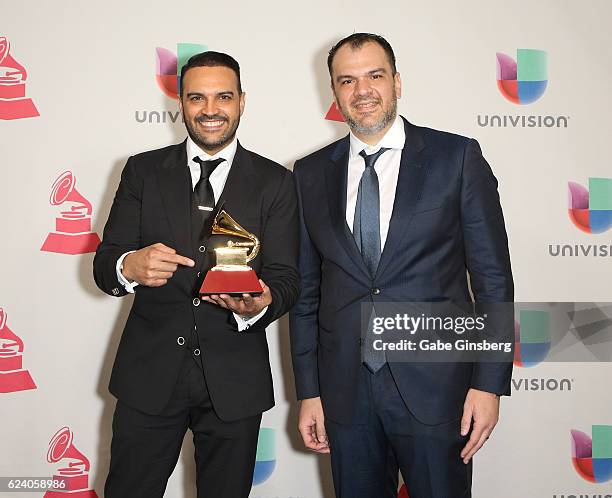 Recording artists Luis Fernando Borjas and Gilberto Aguado of Guaco pose with the Best Contemporary Tropical Album award in the press room during The...