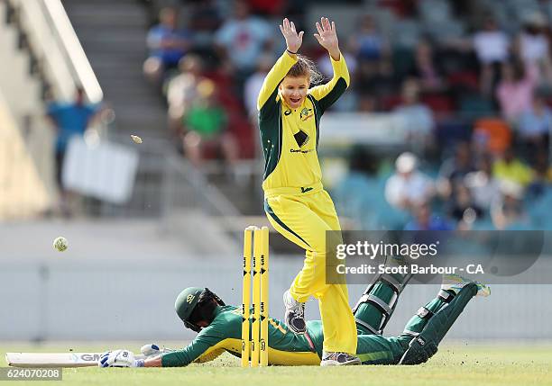 Jess Jonassen of the Australian Southern Stars appeals unsuccessfully to run out Marizanne Kapp of South Africa during the women's one day...