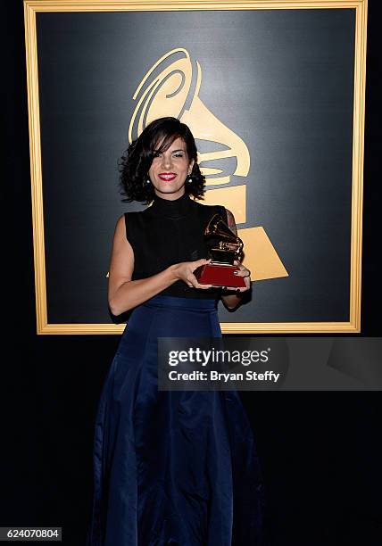 Singer Maria do Ceu Whitaker Pocas, winner of Best Portuguese Language Contemporary Pop Album for 'Tropix,' poses during The 17th Annual Latin Grammy...