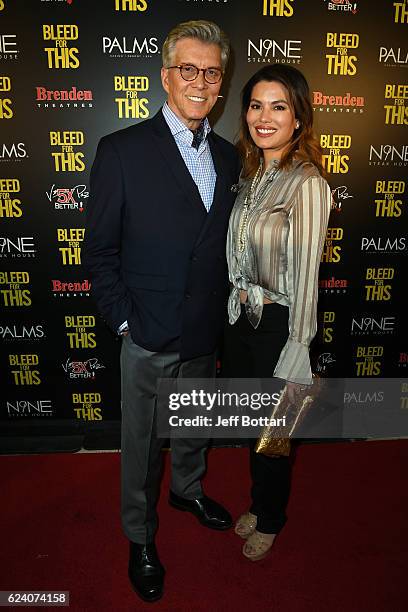 Ring announcer Michael Buffer and Christine Prado attend the Las Vegas screening of the film "Bleed for This" at the Brenden Theatres inside Palms...