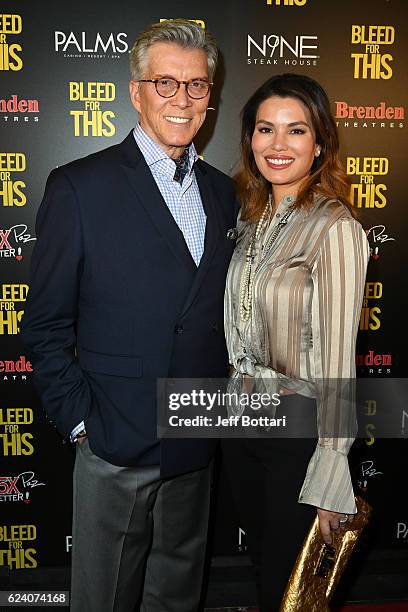 Ring announcer Michael Buffer and Christine Prado attend the Las Vegas screening of the film "Bleed for This" at the Brenden Theatres inside Palms...