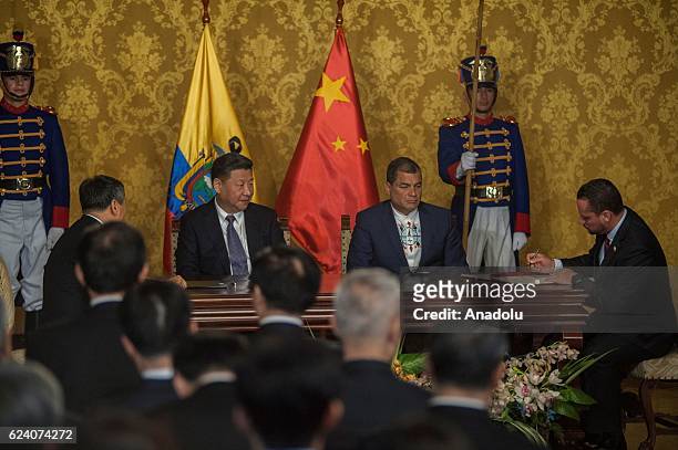 Ecuadorian President Rafael Correa and President of China Xi Jinping attend a press conference after their meeting at the Carondelet Palace in Quito,...