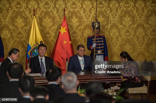 Ecuadorian President Rafael Correa and President of China Xi Jinping attend a press conference after their meeting at the Carondelet Palace in Quito,...