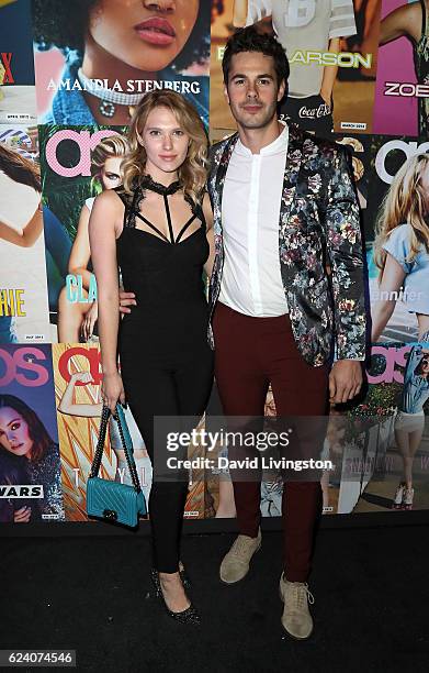 Actors Claudia Lee and Jayson Blair attend the launch of ASOS Magazine US Edition at The Sayers Club on November 17, 2016 in Hollywood, California.