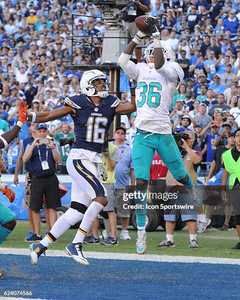 Miami Dolphins Cornerback Tony Lippett intercepts a pass intended for San Diego Chargers Wide Receiver Tyrell Williams during the NFL football game...