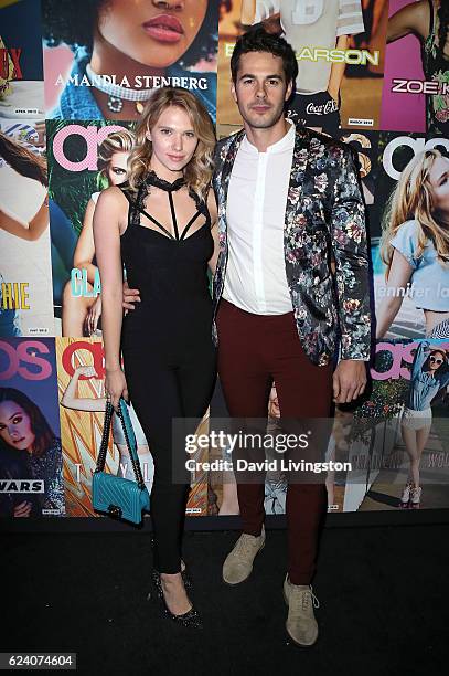 Actors Claudia Lee and Jayson Blair attend the launch of ASOS Magazine US Edition at The Sayers Club on November 17, 2016 in Hollywood, California.