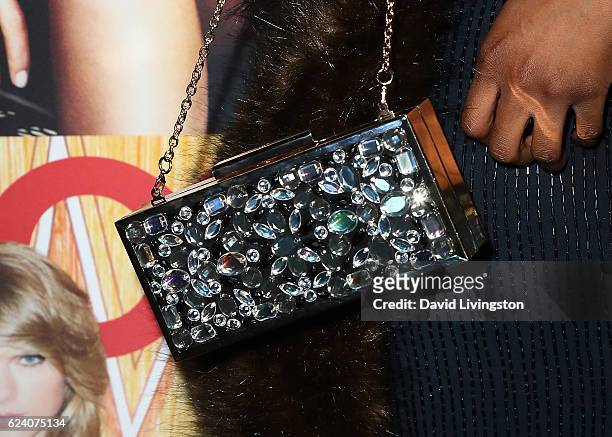 Actress Pepi Sonuga, purse detail, attends the launch of ASOS Magazine US Edition at The Sayers Club on November 17, 2016 in Hollywood, California.