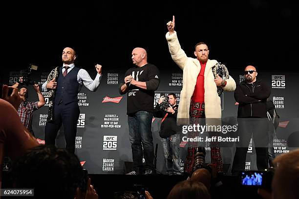 Light champion Eddie Alvarez and UFC featherweight champion Conor McGregor interact with the media and fans during the UFC 205 press conference...