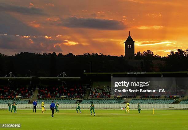 General view as the sun sets during the women's one day international match between the Australian Southern Stars and South Africa at Manuka Oval on...