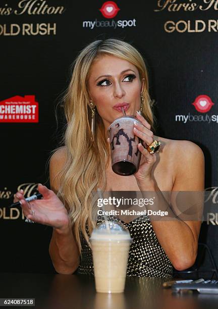 Paris Hilton drinks a McDonalds thickshake during a Q&A with fans at Westfield Doncaster on November 18, 2016 in Melbourne, Australia.