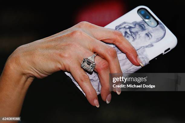 Paris Hilton holds a fans phone for a selfie during a Q&A with fans at Westfield Doncaster on November 18, 2016 in Melbourne, Australia.