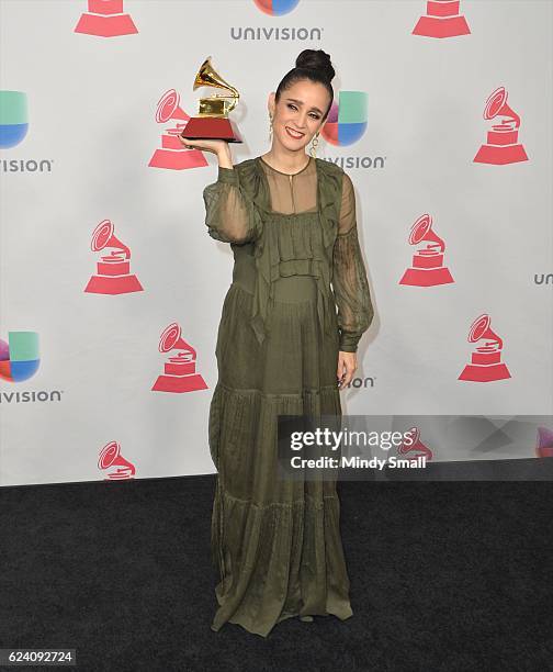 Julieta Venegas poses with the Best Pop/Rock Album award in the press room during the 17th Annual Latin Grammy Awards at T-Mobile Arena on November...