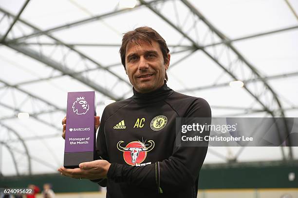 Manager Antonio Conte of Chelsea is awarded the October Manager of the Month at the Chelsea Training Ground on November 17, 2016 in Cobham, England.