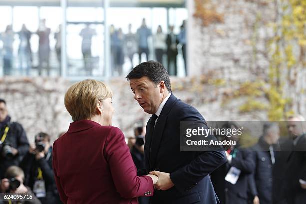 German Chancellor Angela Merkel welcomes Italian President Matteo Renzi prior to the meeting with EU leaders and the US President Barack Obama at the...