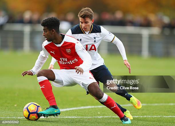 Gedion Zelalem of Arsenal is closed down by Tom Carroll of Tottenham Hotspur during the Premier League 2 match between Tottenham Hotspur and Arsenal...