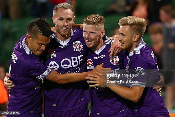 Milan Smiljanic , Rostyn Griffiths, Andy Keogh and Joseph Mills of the Glory celebrate a goal during the round seven A-League match between the Perth...