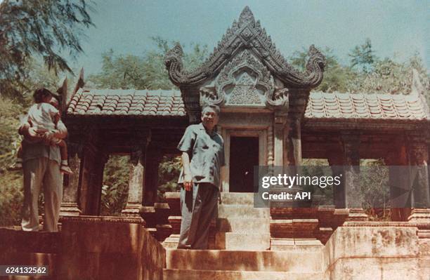 Pol Pot visiting a khmer temple, near Surin, in Thailand, in 1987.