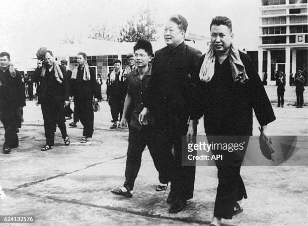 Pol Pot , Chinese ambassador Sun Hao and foreign minister Ieng Sary in Phnom Penh, Cambodia, circa 1975 .