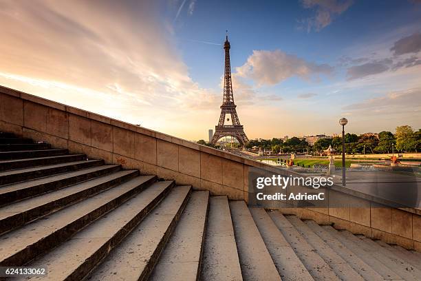 strairs through eiffel tower during moring in paris - louvre fotografías e imágenes de stock