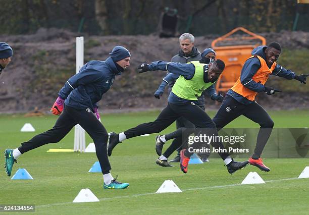 Paul Pogba and Timothy Fosu-Mensah of Manchester United in action during a first team training session at Aon Training Complex on November 18, 2016...