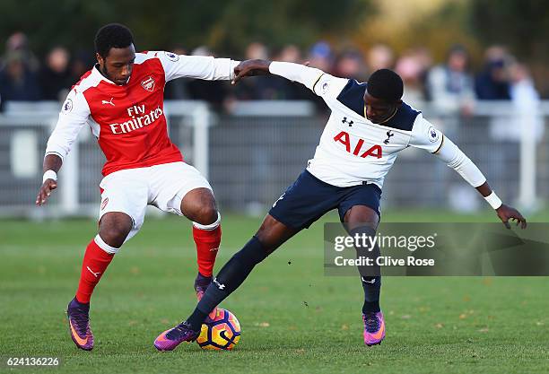 Kaylen Hinds of Arsenal challenges Shilow Tracey of Tottenham Hotspur during the Premier League 2 match between Tottenham Hotspur and Arsenal at...