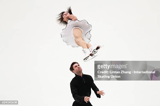 Lubov Iliushechkina and Dylan Moscovitch of Canada compete in the Pairs Short Program on day one of Audi Cup of China ISU Grand Prix of Figure...
