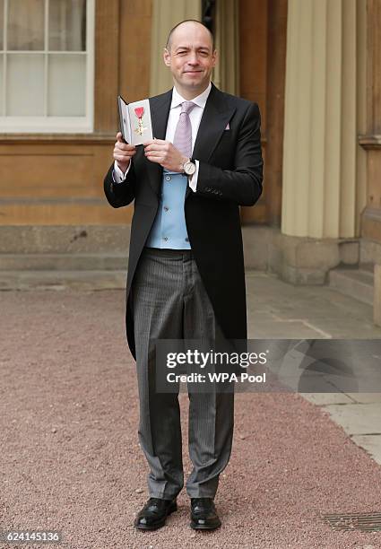 Gareth Neame with his OBE which he received which he received from the Prince of Wales during an Investiture ceremony at Buckingham Palace on...