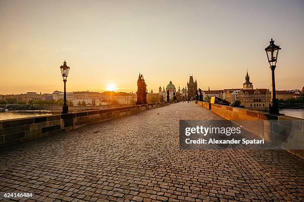 sunrise above prague seen at charles bridge, czech republic - european culture stock pictures, royalty-free photos & images