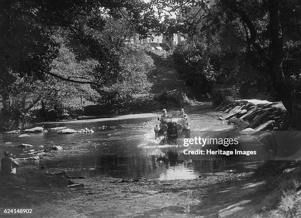 Lea-Francis competing in the Mid Surrey AC Barnstaple Trial, Tarr Steps, Exmoor, 1934. Artist: Bill Brunell.Lea-Francis Event Entry No: 28. Place:...