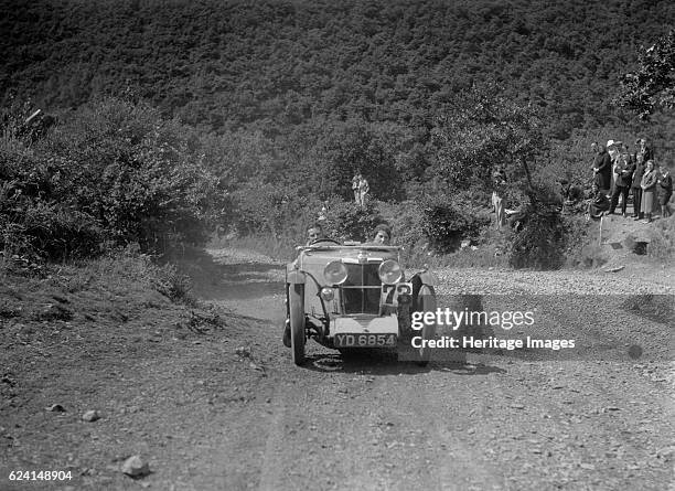 Competing in the Mid Surrey AC Barnstaple Trial, Beggars Roost, Devon, 1934. Artist: Bill Brunell.MG J2 1933 847 cc. Vehicle Reg. No. YD6854. Event...