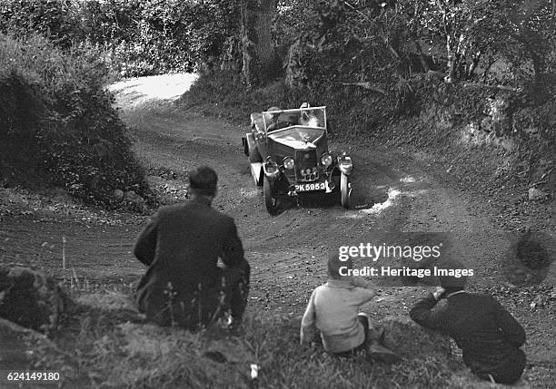 Riley of CJS Montague-Johnson, B&HMC Brighton-Beer Trial, Simms Hill, Ilsington, Devon, 1930. Artist: Bill Brunell.Riley Open 4-seater tourer 1929...