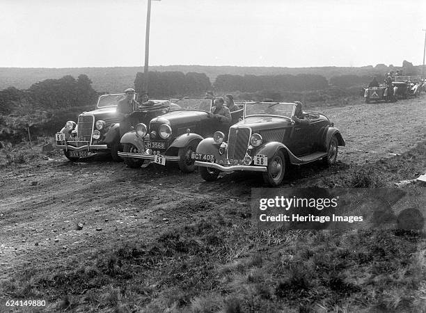 Three Ford V8s at the Sunbac Inter-Club Team Trial, 1935. Artist: Bill Brunell.Ford V8 Drop head 1934 3622 cc. Reg. No. BGT407. No: 58. Driver:...