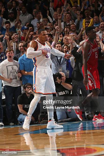Russell Westbrook of the Oklahoma City Thunder celebrates and pounds his chest after dunking the ball against the Houston Rockets on November 16,...