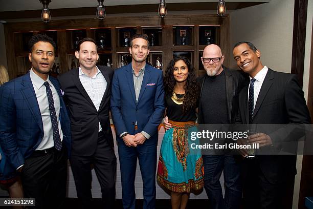 Eric Benet and Manuela Testolini pose with guest at the 'In A Perfect World Give 100 Fundraiser' at The District Restaurant on November 17, 2016 in...